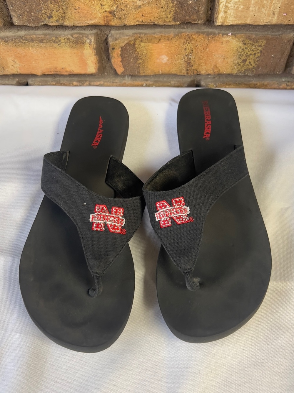 Men's Black Flip-Flops with Red Logo Accent